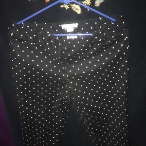 Black pants with white polkadots